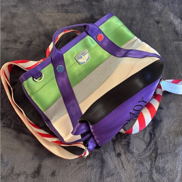 Harveys Handbags - Harveys Striped Backpack in Green, Purple, and Silver